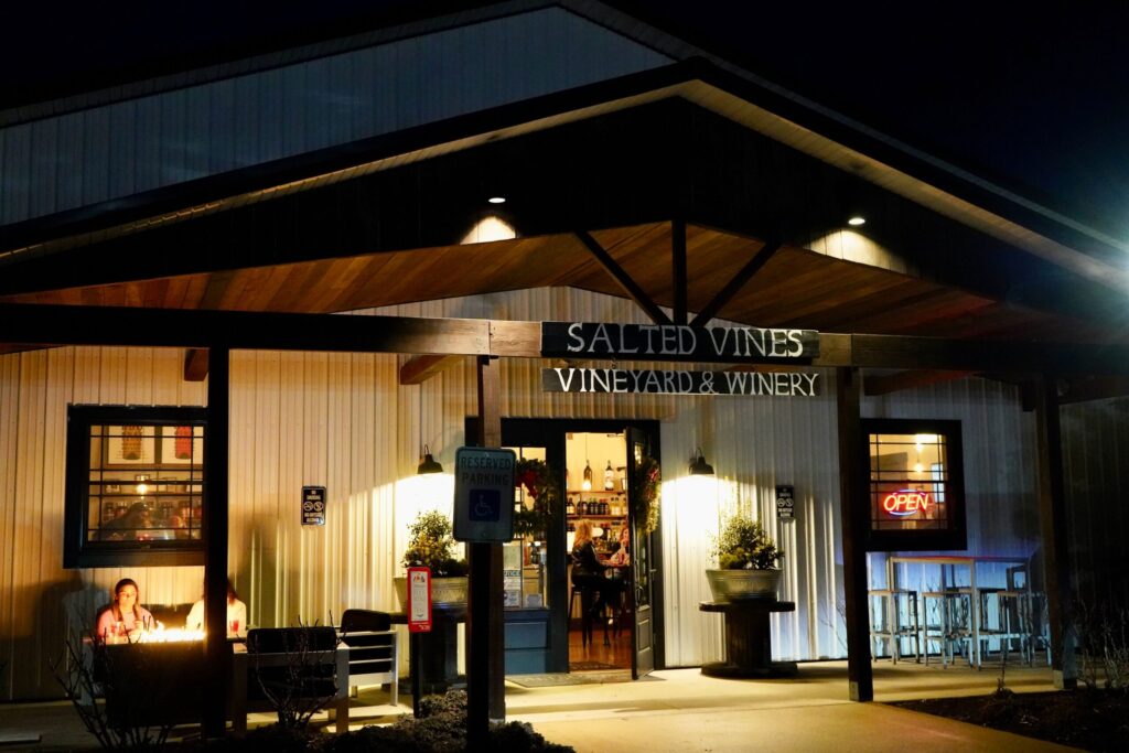 a winery at night with lights on