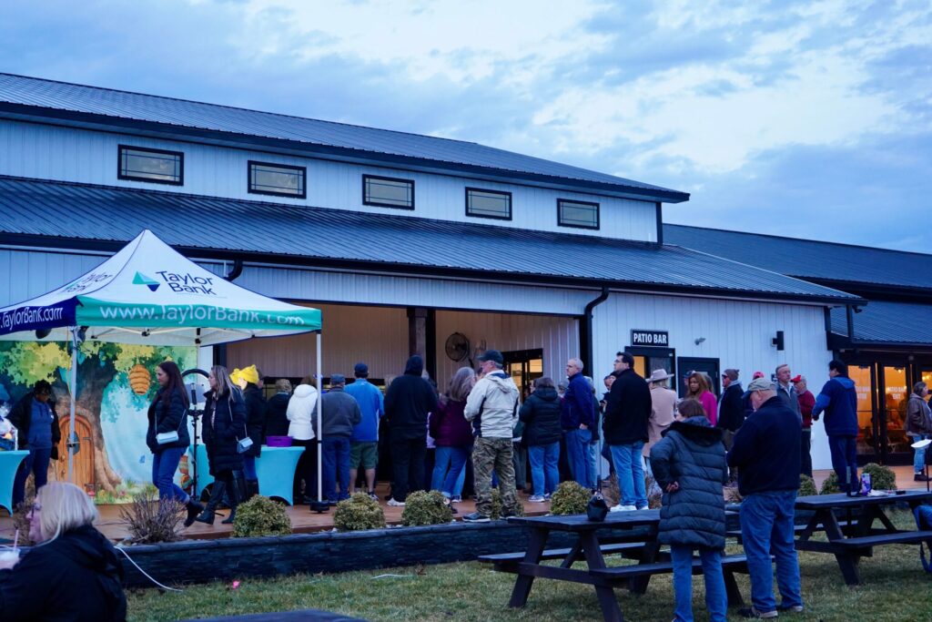 a group of people standing outside of a building
