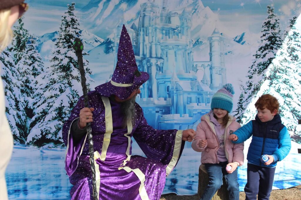 a group of young children standing next to each other