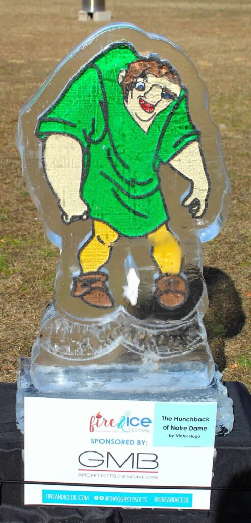 a glass trophy with a cartoon character on it