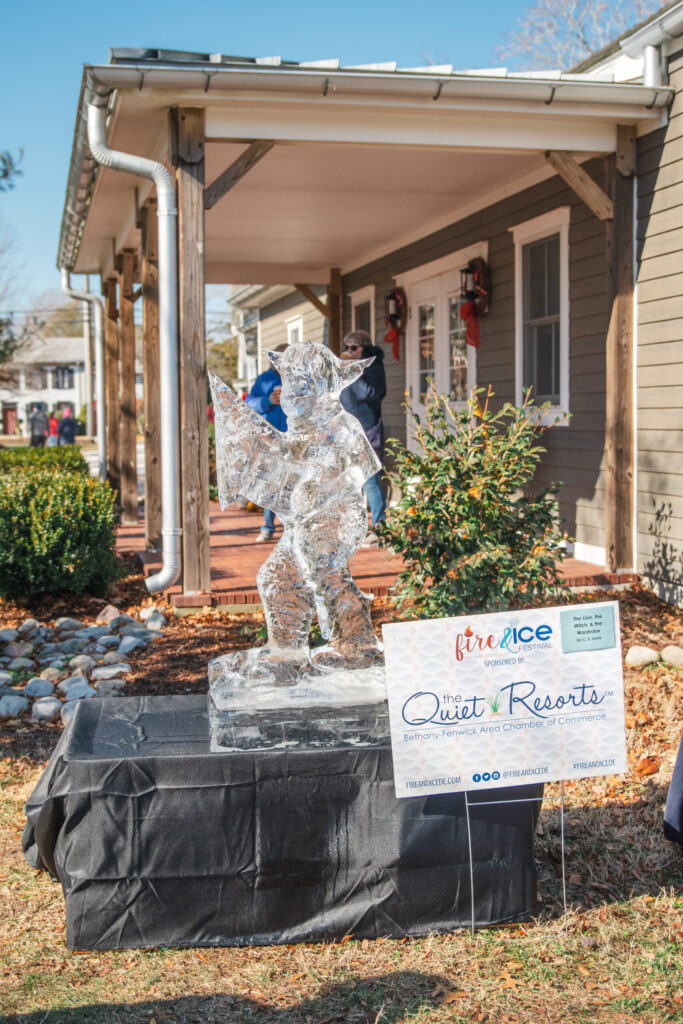 a woman standing in front of a house