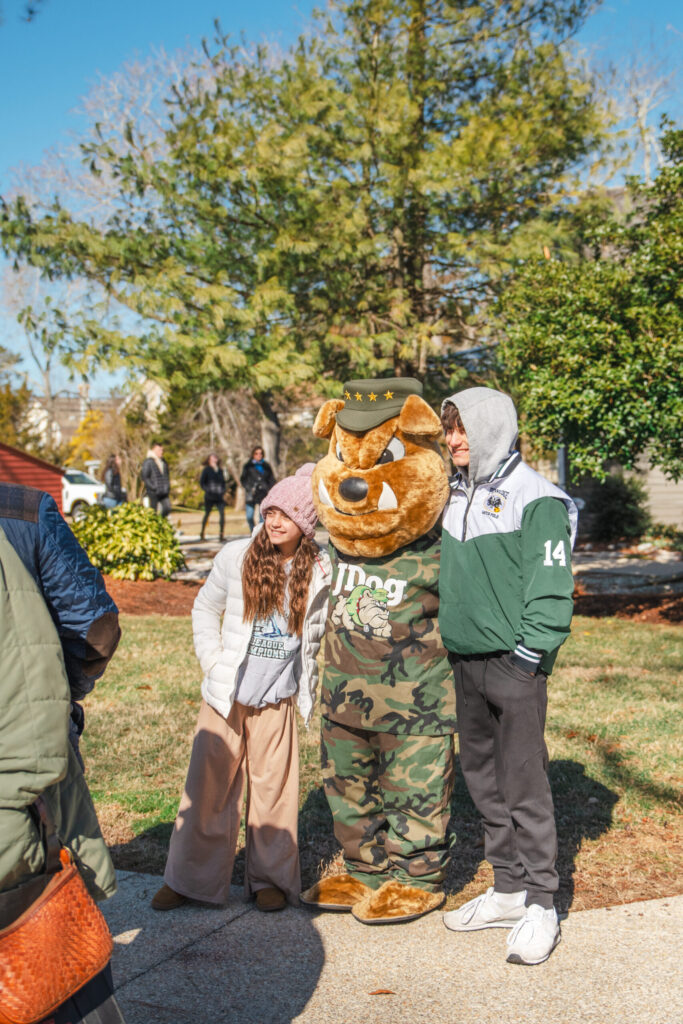 a group of people standing next to each other