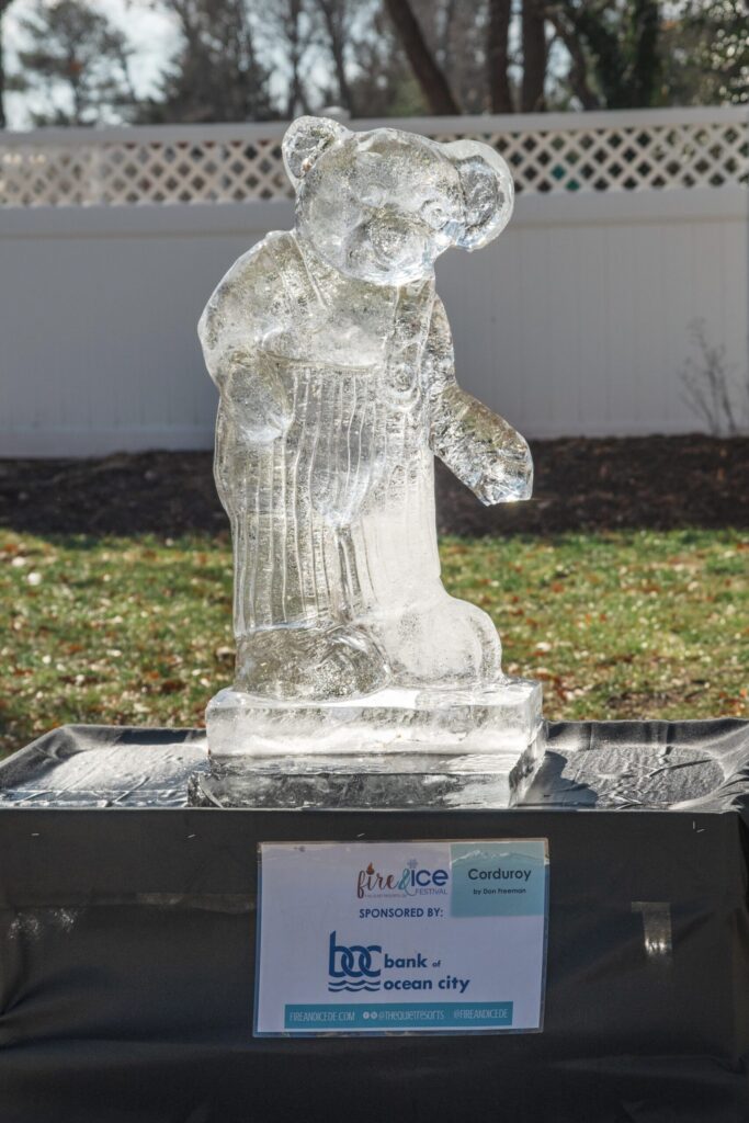 a large ice sculpture of a bear holding a baseball bat