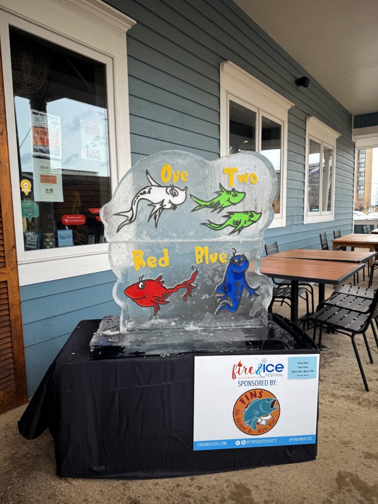 an ice sculpture of dr seuss and the cat in the hat