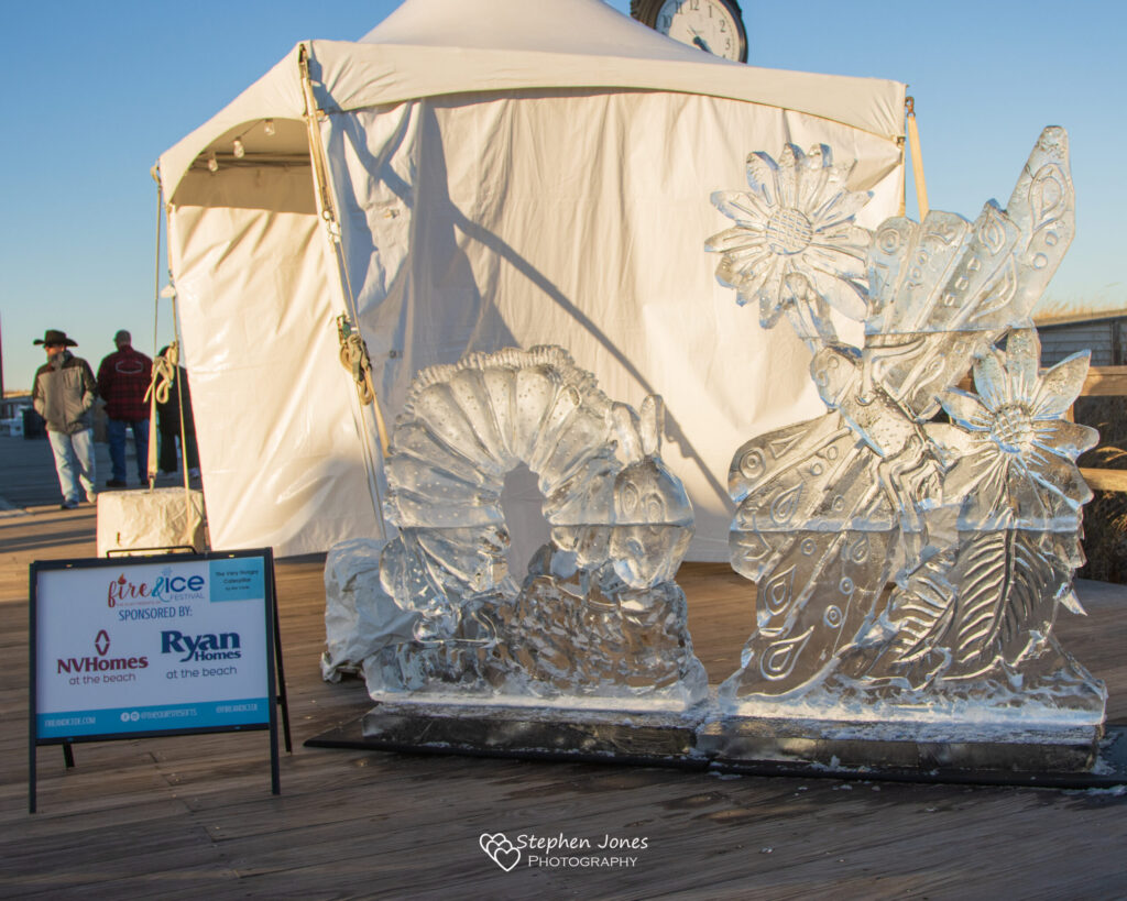 an ice sculpture on a wooden pier