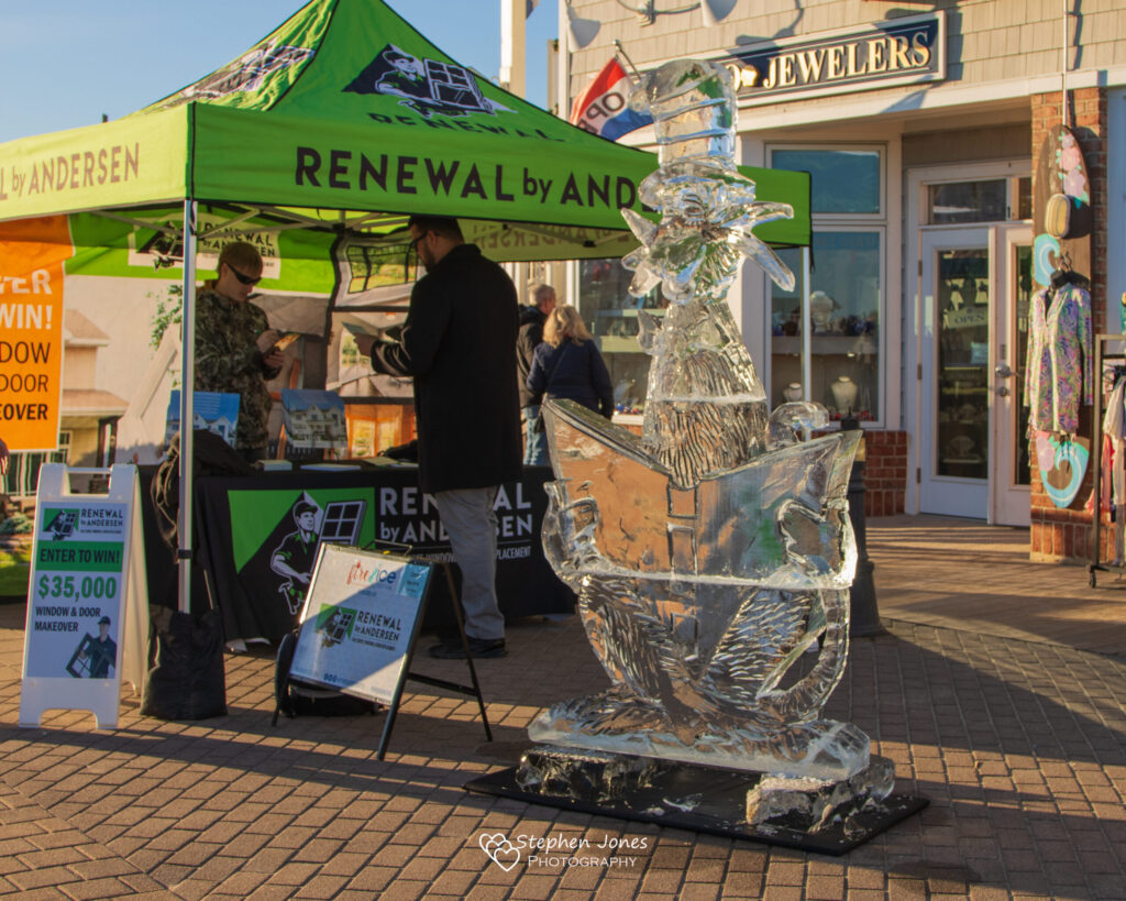 a glass vase sitting on top of a metal stand