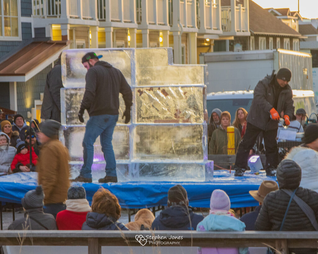 a group of people standing on top of a stage
