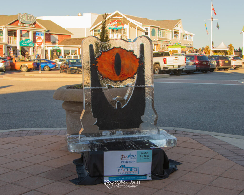 an ice sculpture of a man's face on a street corner