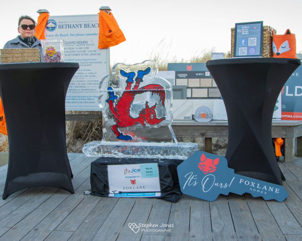 a man standing behind a podium with a sign on it