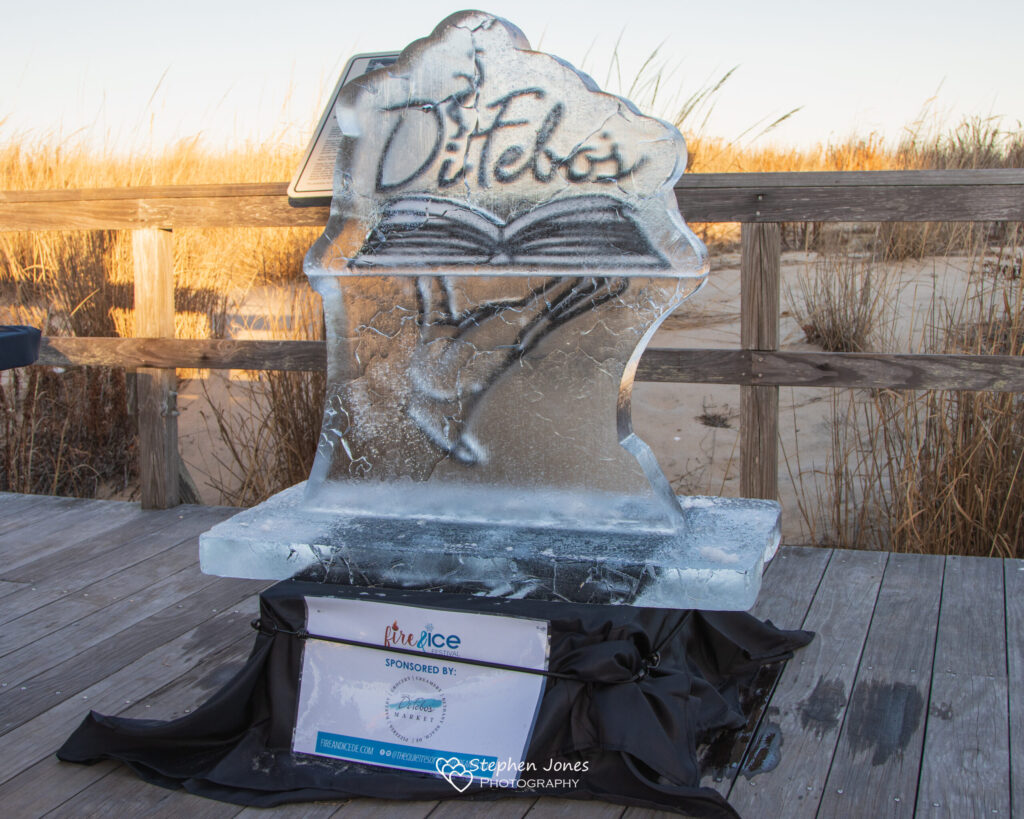an ice sculpture with a book on top of it