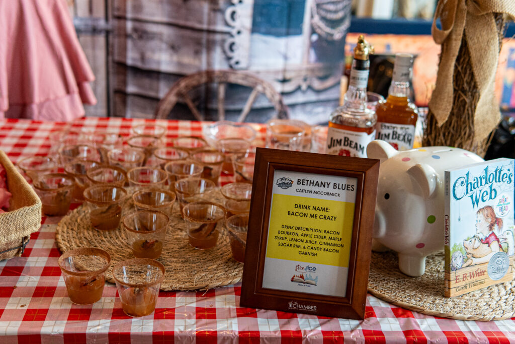 a red and white checkered table topped with glasses