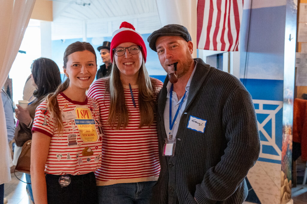 a group of people standing next to each other