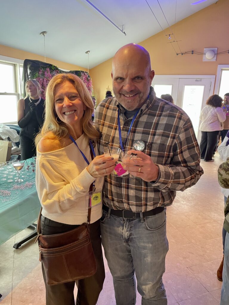 a man and a woman standing next to each other