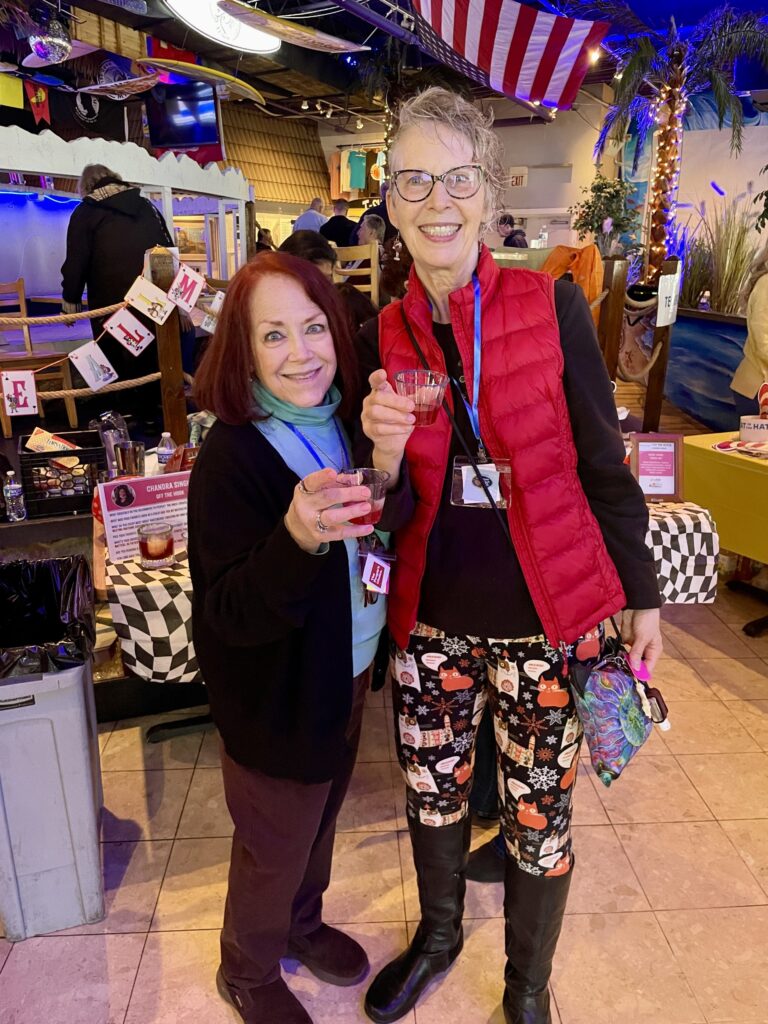 a couple of women standing next to each other