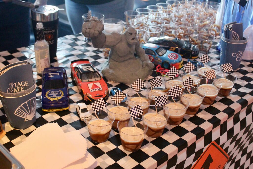 a table topped with cups filled with drinks