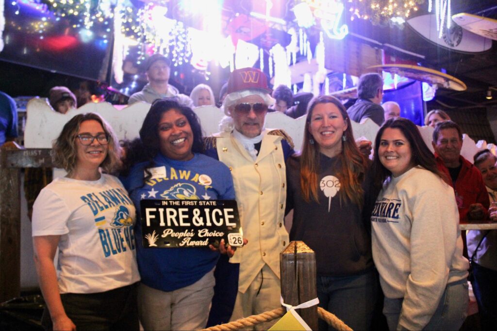 a group of people standing next to each other