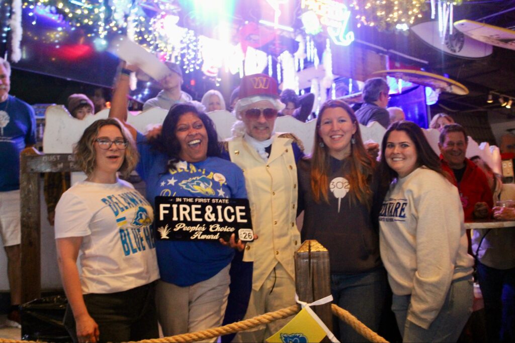 a group of people standing next to each other