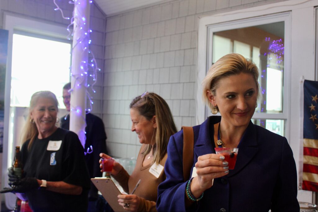 a group of women standing around each other