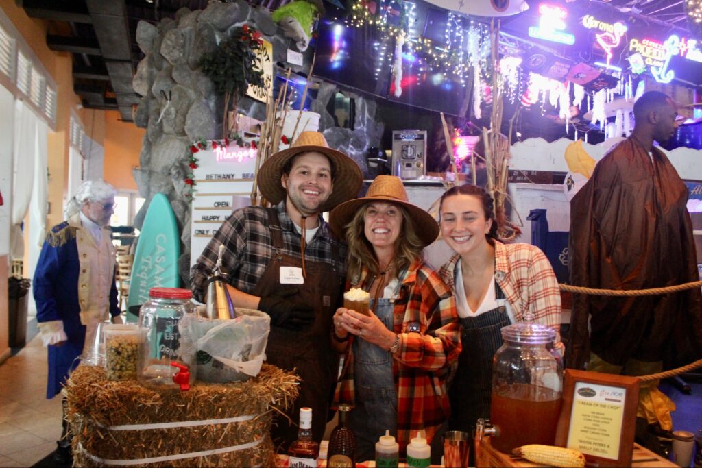 a group of people that are standing in a room