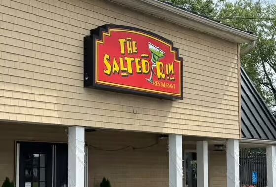 a building with a sign that says the salted dm