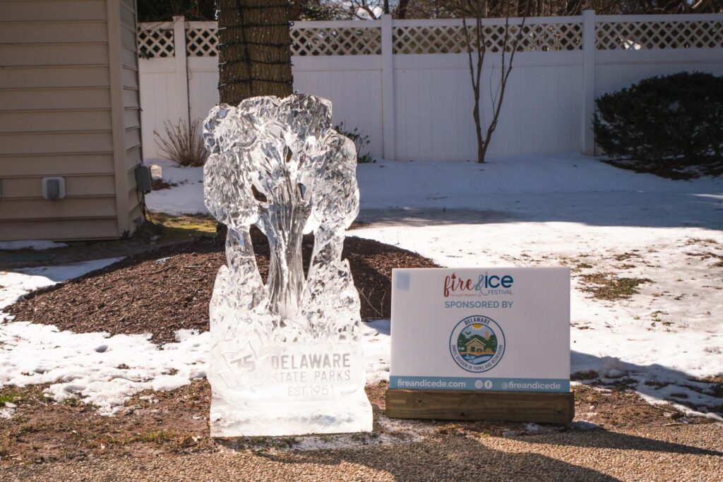 a statue of an elephant is in the snow