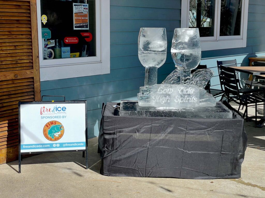 a couple of wine glasses sitting on top of a table