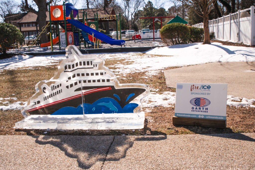 a playground with a fake boat in the middle of it