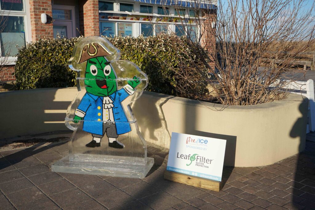 a statue of a cartoon character in front of a building