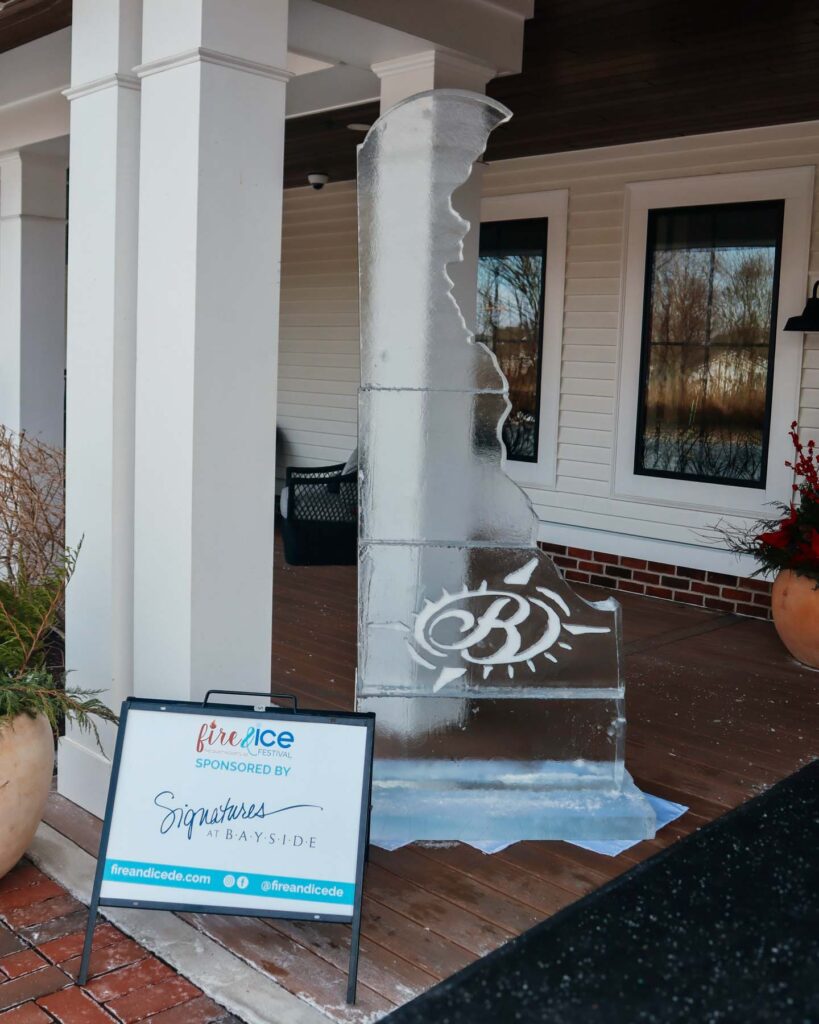 a sign on the front porch of a house