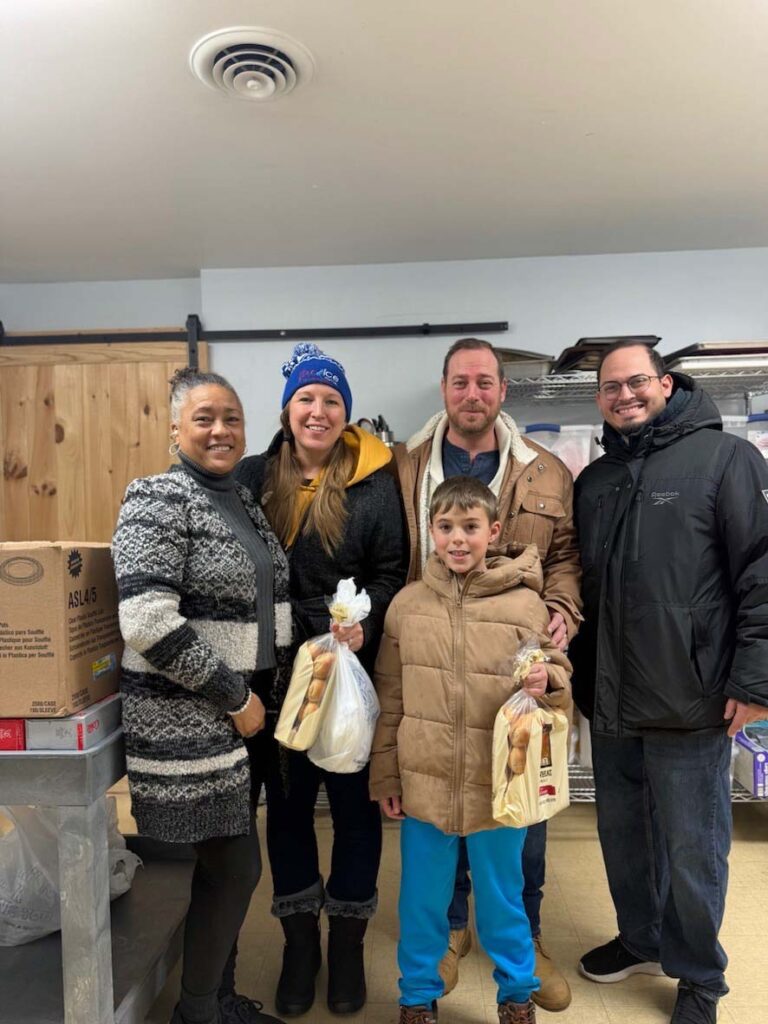 a group of people standing next to each other