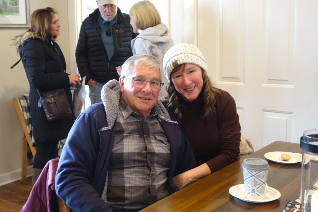 a man and a woman sitting at a table