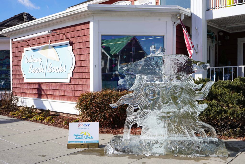 a statue of a dog on a sidewalk in front of a building