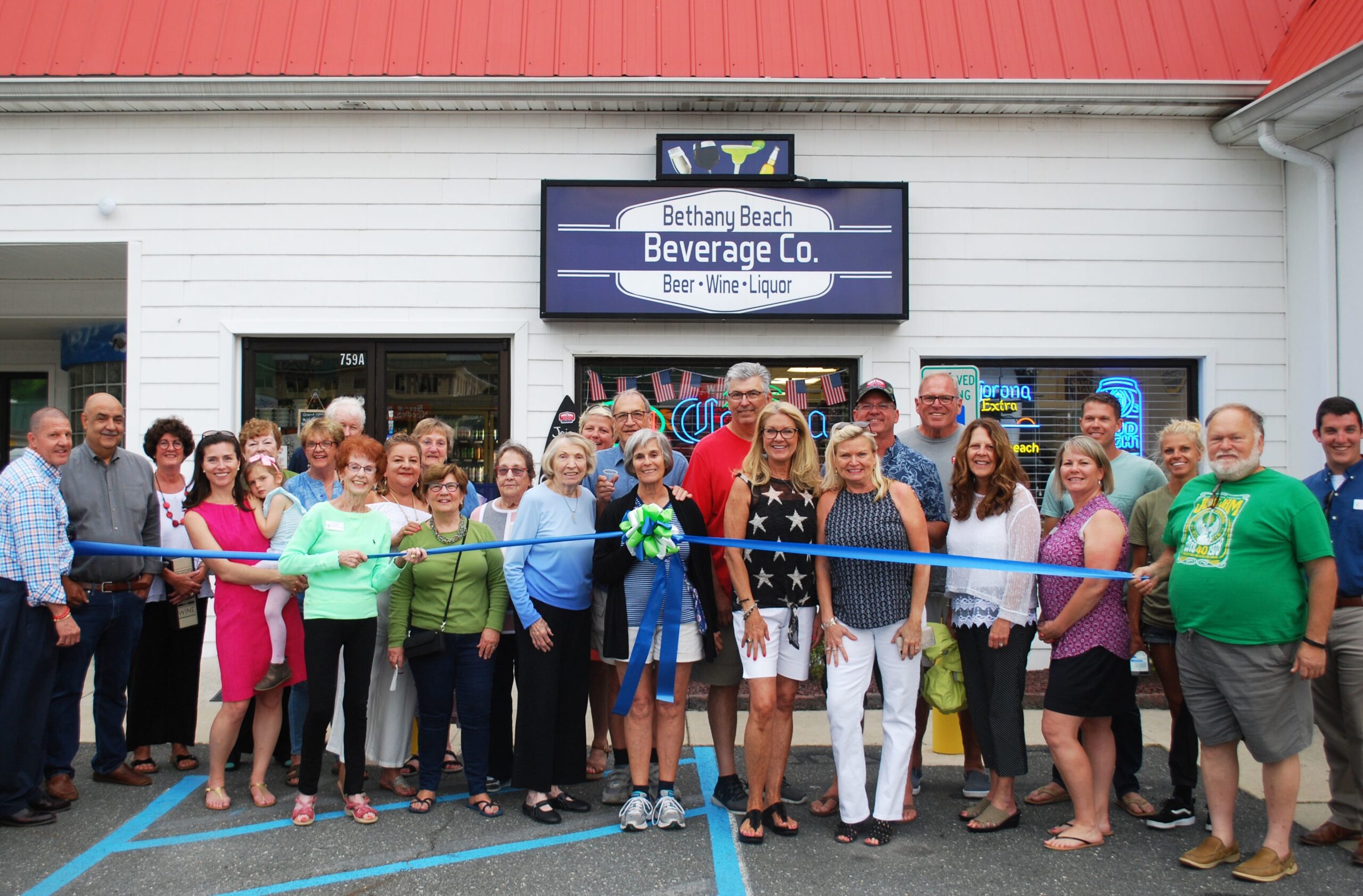 cutting ribbon bethany beach beverage co
