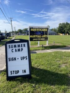 a sign that is sitting in the grass