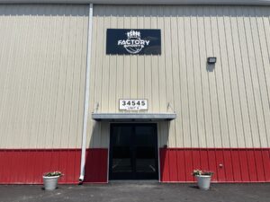 a building with a sign that says factory