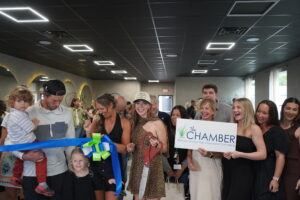 a group of people standing around each other