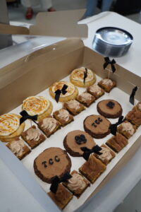 a box of cookies with faces on them