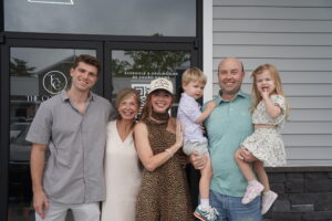 a group of people standing outside of a building