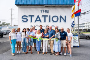 a group of people standing in front of a building