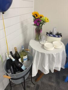 a bunch of bottles of wine sitting on a table