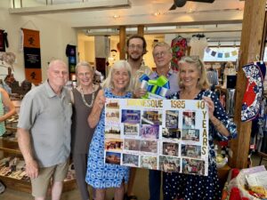 family-with-sign-horizontal.jpg