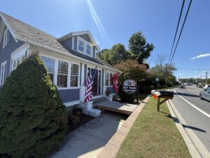 a house with a flag on the front of it