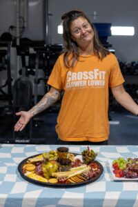 Stephanie-with-charcuterie-scaled.jpg