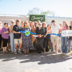 a group of people standing in front of a building