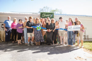 a group of people standing in front of a building