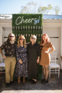 a group of people standing next to each other