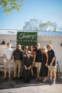 a group of people standing in front of a building