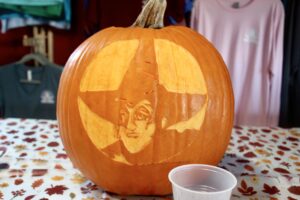 a carved pumpkin with a face on it