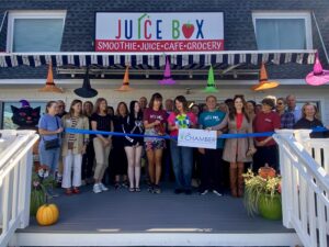 a group of people standing outside of a building