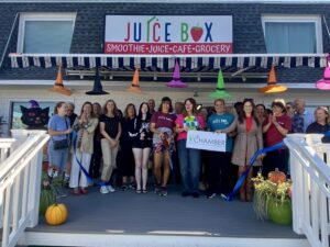 a group of people standing outside of a building
